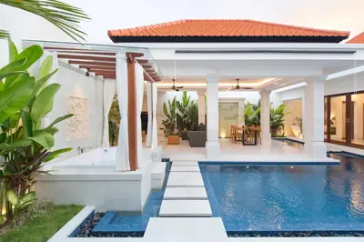 a villa with a swimming pool and a house at Villa Mia Seminyak - Boutique Villas - I in Seminyak