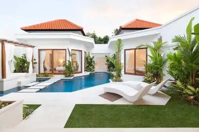 a villa with a swimming pool and a house at Villa Mia Seminyak - Boutique Villas - I in Seminyak