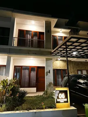 a house with a car parked in front of it at Casa Danasa, secure and serene Villa at the heart of Seminyak with 24hr One Gate Security in Seminyak