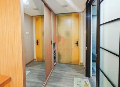 a hallway with two doors and a hallway with at Newly Lavaya Resort 1BR with pool in Nusa Dua