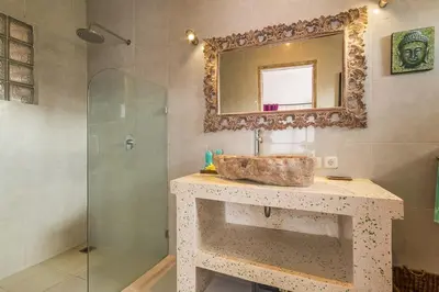 a bathroom with a sink and a shower at Villa emma, 2 bed with pool table & private pool in Seminyak