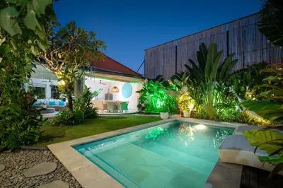 a swimming pool in the backyard of a house at Villa 888 Eat Shop Play - 3BR Private Pool Oberoi in Seminyak