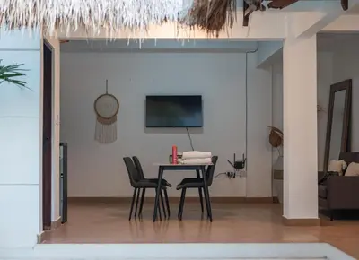 a dining room with a table and chairs at 2BR Villa - Central Seminyak - Private Cook & Breakfast in Seminyak