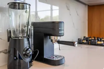 a black blender sitting on top of a counter at Villa Rice Kerobokan in Kerobokan