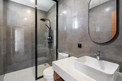 a bathroom with a sink and a shower and a toilet at New Villa 3BR Umalas Pool Near Seminyak and Canggu in Canggu