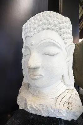 a white statue of a head on a table at Superb and Elegant 3-Bedroom Villa Close to the Beach in Seminyak