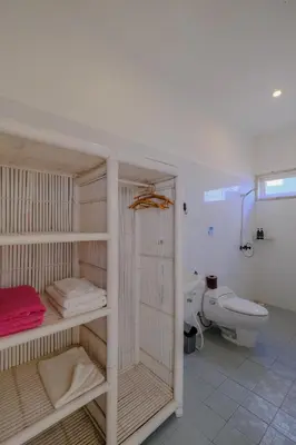 a bathroom with two bunk beds and a toilet at Villa Beji Ayu Seminyak - 2 Bedroom Private Pool in Seminyak