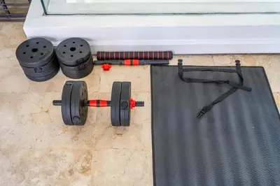 a pair of dumbbells on the floor next to a car at Villa Azure 2 - Private Pool Villa near Seminyak Centre in Seminyak