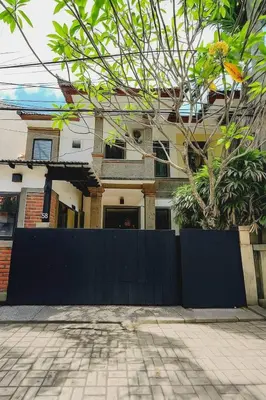 a house with a black fence in front of it at 3 Bedroom Villa in Prime Seminyak Location, Walk to Beach in Seminyak