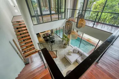 an overhead view of a living room with a pool at Modern 4BR Industrial - Tropical Escape in Umalas in Kerobokan