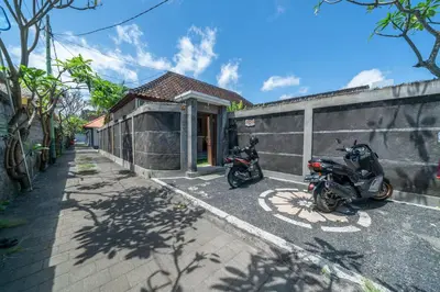 two motorcycles parked in front of a building at Villa Dream Seminyak in Seminyak