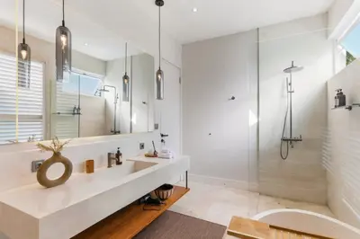 a bathroom with a sink and a shower at Luxury Villa in Berawa Beach 3BR - Canggu in Canggu