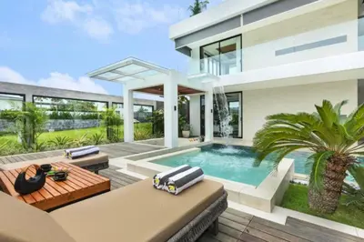 an image of a house with a swimming pool at Tanaya Luxury 4 BR Private Pool Villa in Canggu