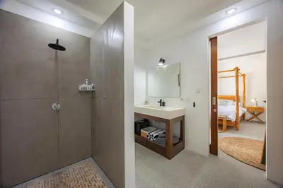 a bathroom with a shower and a sink at Ola - Private Villa - Umalas in Kerobokan