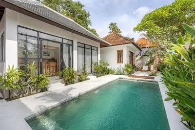 an image of a swimming pool in front of a house at Ola - Private Villa - Umalas in Kerobokan
