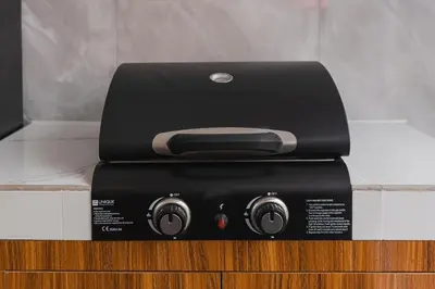 a black appliance sitting on top of a box at Xxtra Villa in Seminyak