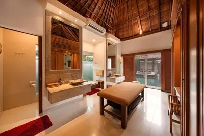 a bathroom with a sink and a mirror at Luxury 1BR Villa with Private Pool in Seminyak in Seminyak