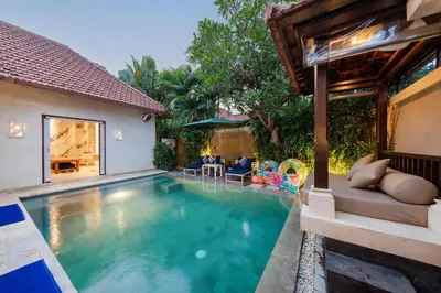 a swimming pool in the backyard of a house at Luxury 1BR Villa with Private Pool in Seminyak in Seminyak
