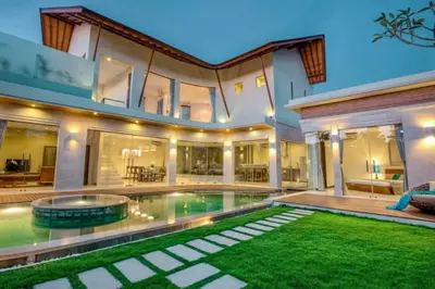 a large house with a swimming pool in the yard at Ekavira Peaceful 2 BR Private Pool Villa in Seminyak