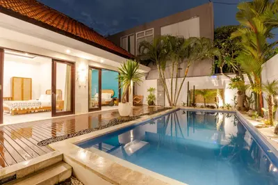a swimming pool in a villa with a house at Canggu 3BR Private Pool Villa 3 min to Beach Finns in Canggu