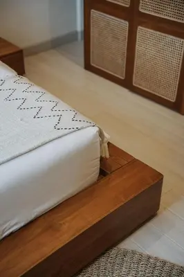 a close up of a bed in a room at Casa Amani 3BR Mediterranean w Pool Near Seminyak in Kerobokan
