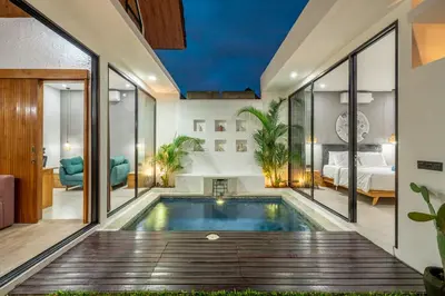 a swimming pool in a house with a bedroom at Harmony A29-Peaceful 1BR Retreat in Seminyak