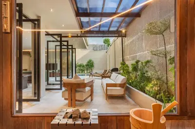 an open living room with a glass ceiling at Konoha Villa Umalas in Mantaak