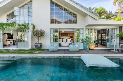 a house with a swimming pool in front of it at luxury villa in seminyak in Seminyak