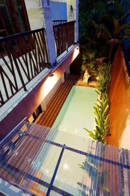a swimming pool on top of a house at 3 Bedrooms Villa with Pool WEST SANUR - Casa Del Lago in Sanur