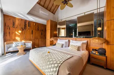 a bedroom with a large bed in a room at Alora Comfortable 1 BR Smart Pool Villa With Jacuzzi in Seminyak