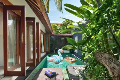 a pool with a rubber duck in the middle of a house at Bahira Lovely 1 BR Grand Pool Villa With Bathtub in Legian