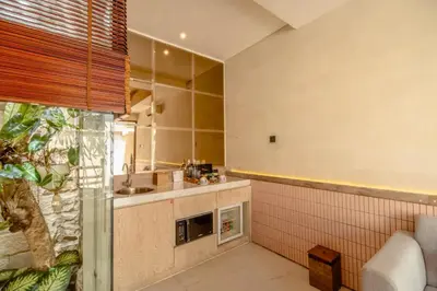a kitchen with a sink and a counter top at Emica Peaceful Royal 1 BR Pool Villa With Bathtub in Legian