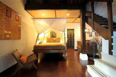 a bedroom with a bed with a canopy at Luxury 6-bedroom Villa in Seminyak in Seminyak