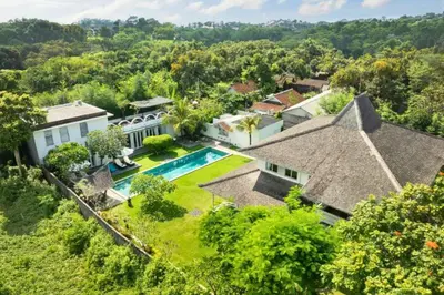 an aerial view of a house with a swimming pool at Dulcinea Spacious 5 BR Private Pool Villa in Jimbaran