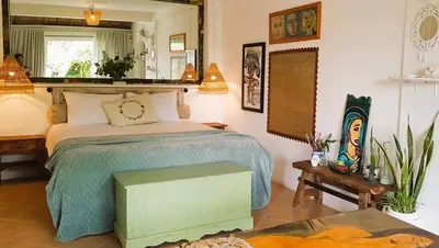 a bedroom with a bed and a mirror at Charming, Homely, Pool, Lush Gardens, Umalas, Cozy in Kerobokan