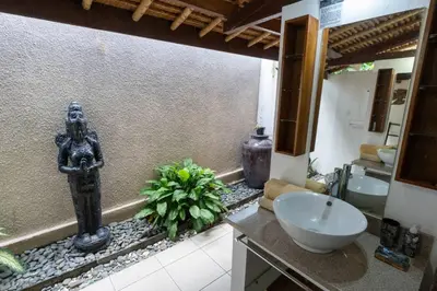 a bathroom with a sink and a counter with a bowl at Kangin villa 2 bedrooms in the heart of Seminyak in Kuta