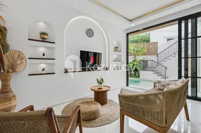 a living room with a table and chairs at Salila Villa by Kozystay - Umalas in Kerobokan