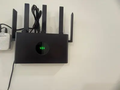 a black box with a green light on a wall at Private Room Near Sanur Beach Bali in Sanur