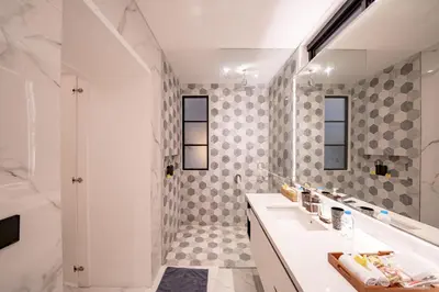 a bathroom with a sink and a shower at Villa Samyati Kerobokan in Seminyak