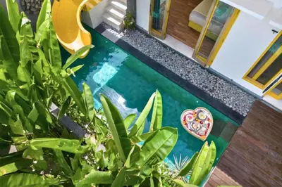 a house with a painting of a swimming pool at Tindra Stunning 2 BR Royal Private Pool Villa With Waterslide in Kerobokan