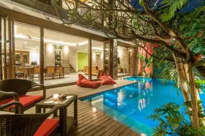 a swimming pool in the middle of a house at A Luxurious Boutique Villa in Seminyak's Heart in Seminyak