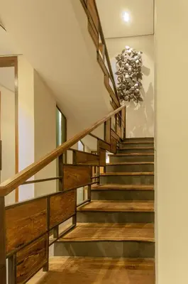 a staircase in a house with a chandelier at A Luxurious Boutique Villa in Seminyak's Heart in Seminyak