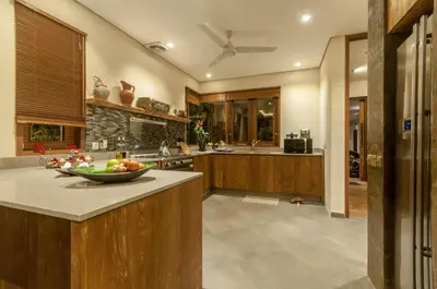 a kitchen with a bowl of fruit on a counter at A Luxurious Boutique Villa in Seminyak's Heart in Seminyak