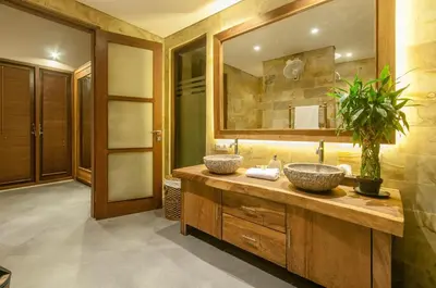 a bathroom with two sinks and a mirror at A Luxurious Boutique Villa in Seminyak's Heart in Seminyak