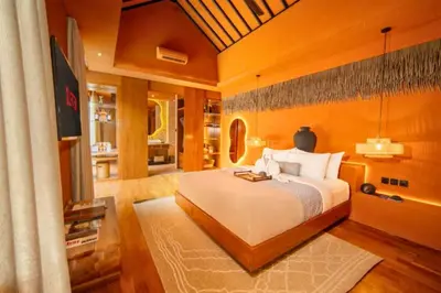 a bedroom with a large bed in a room at Yaseera Aesthetic 1 BR Grand Smart Private Pool Villa in Seminyak