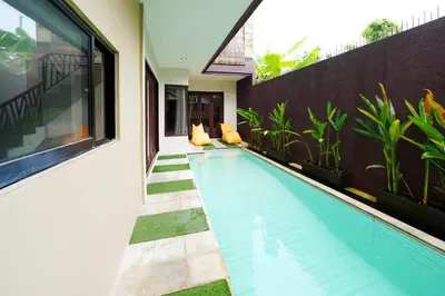 a swimming pool in the backyard of a house at 3Bedrooms Villa with Pool West Sanur - Casa Del Sol in Sanur