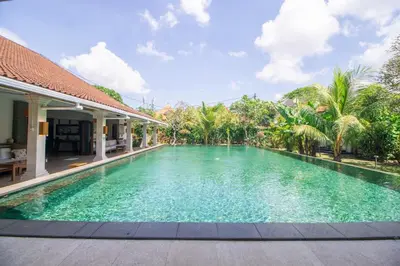 a swimming pool in the backyard of a villa at Beachside Luxury Private Villa in Sanur in Sanur
