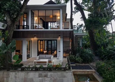 a large house with a living room with a couch at Luxury with A Soul - Martini 2 1BR Villa Reimagined in Kerobokan