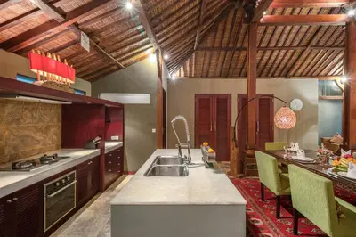 a kitchen with a sink and a counter top at Joglo-Style 3 Bedroom Villa in Heart Of Seminyak in Seminyak