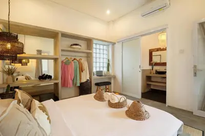 a room with a table with hats on it at 5 min walk to Seminyak Beach - Architect Designed Luxury Villa - Private Butler & Breakfast in Seminyak
